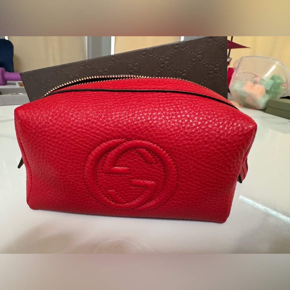 Gucci Red Leather cosmetic pouch - never used . Authentic